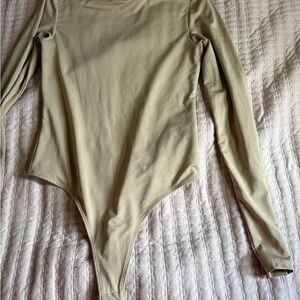 Charlotte Russe Long Sleeve Beige Bodysuit